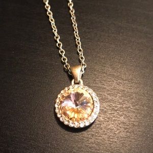 Yellow gem necklace.